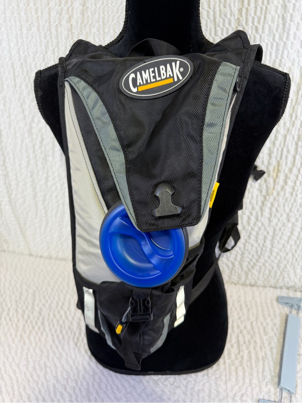 CamelBak Black and Gray Hydration Pack with Blue Cap
